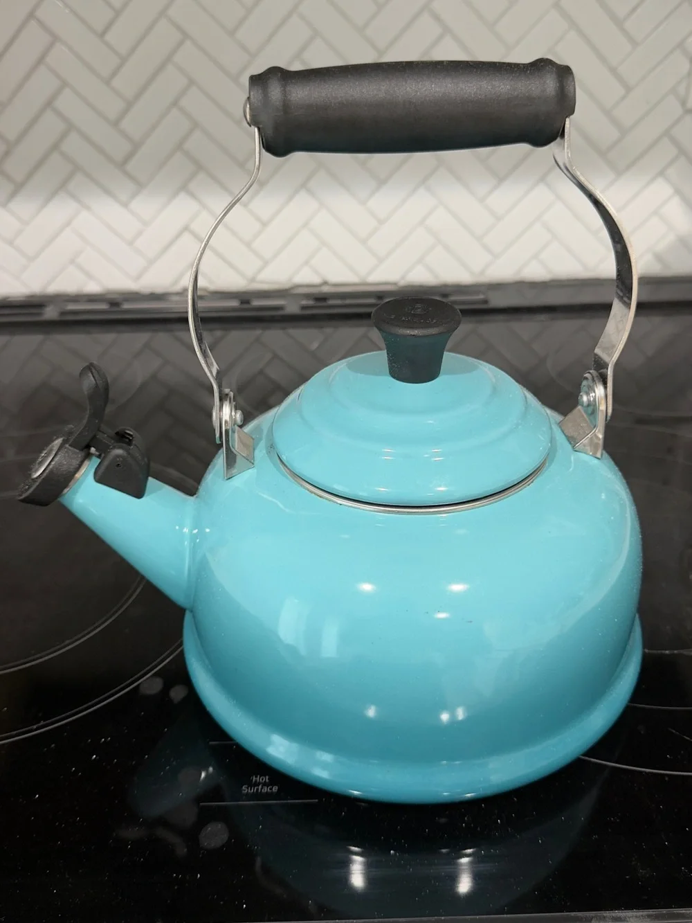 Le Cruset Turquoise Whistling Tea Kettle with Black Handle